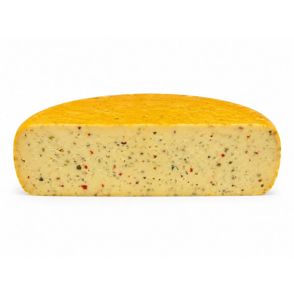 Wheel of cheese with mixed herbs and jalepeno