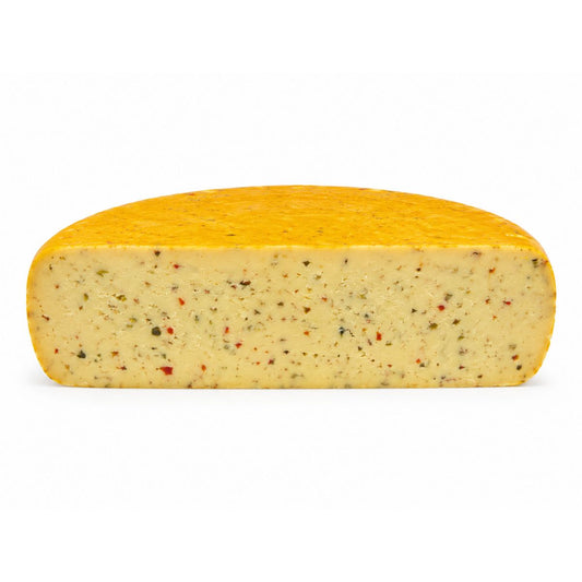 Wheel of cheese with mixed herbs and jalepeno